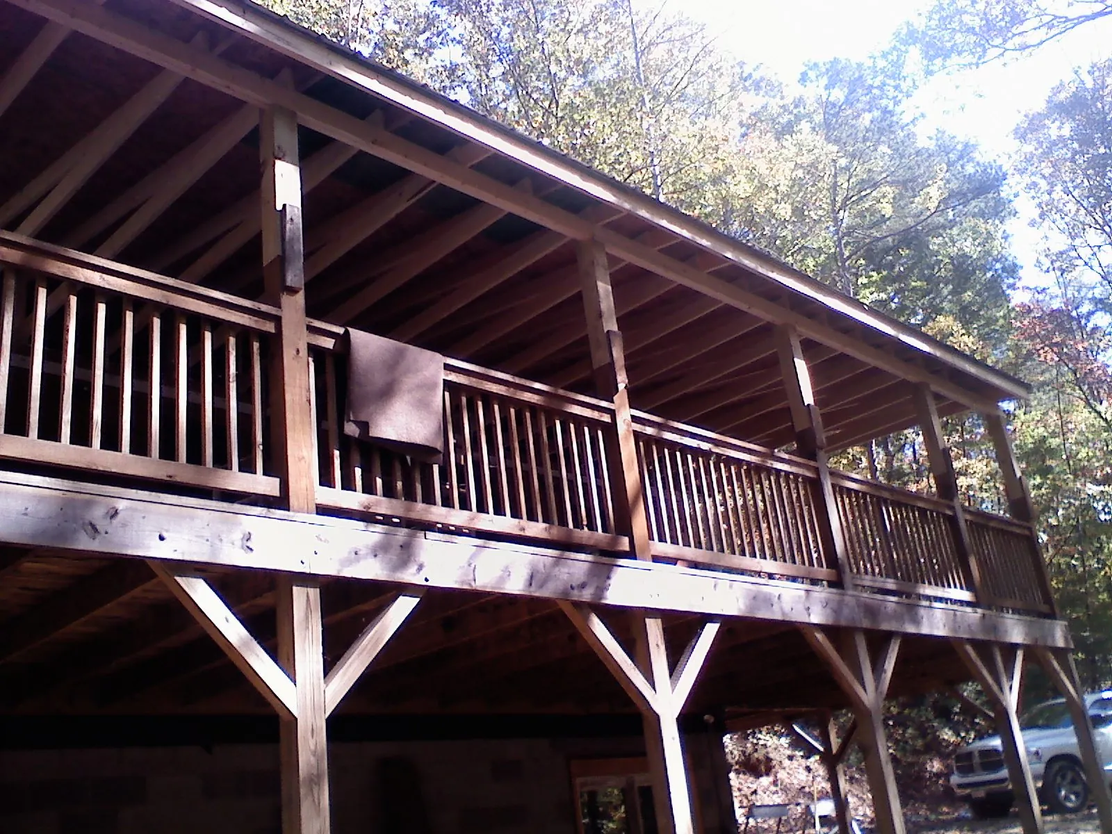 Timber framing under a new elevated porch and deck — Roof Leak Repair in North Jackson by Roofing Brothers